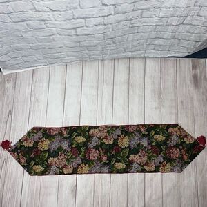 Floral print table runner with fringe ends approx 
52”x12.5”